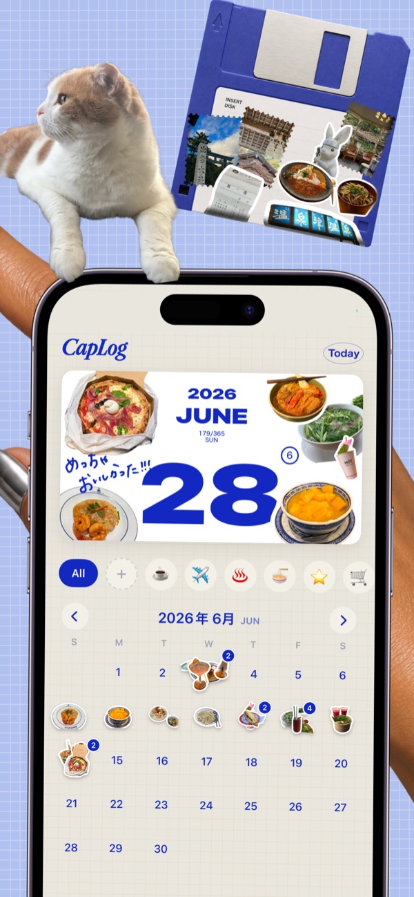 カレンダーにシールがたまっていく画面（猫とフロッピーのシール）